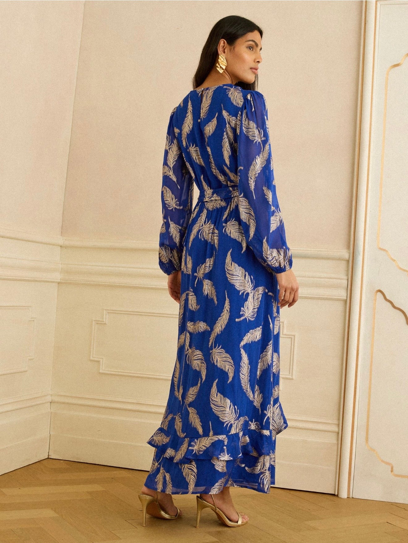 WLD dress with metallic gold feather