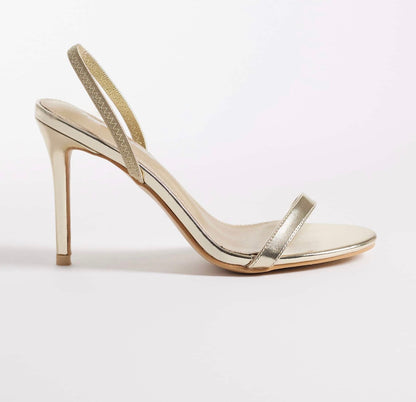Heeled sandal in gold