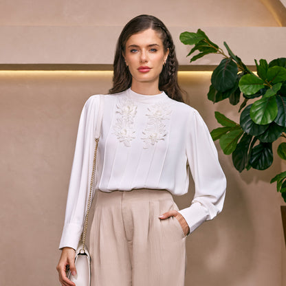 White blouse with neck flowers