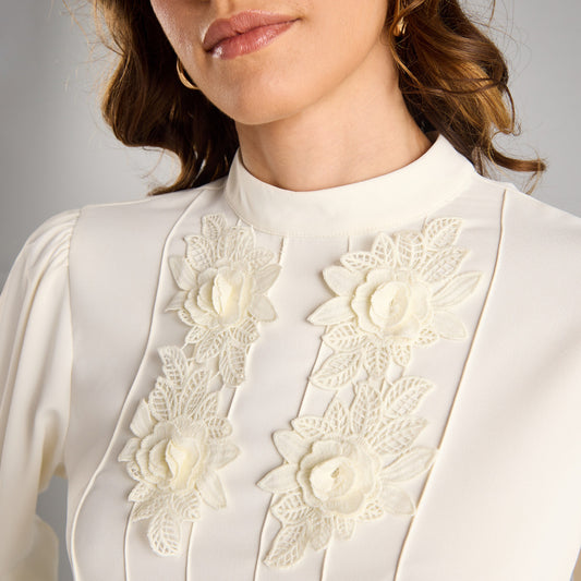 White blouse with neck flowers